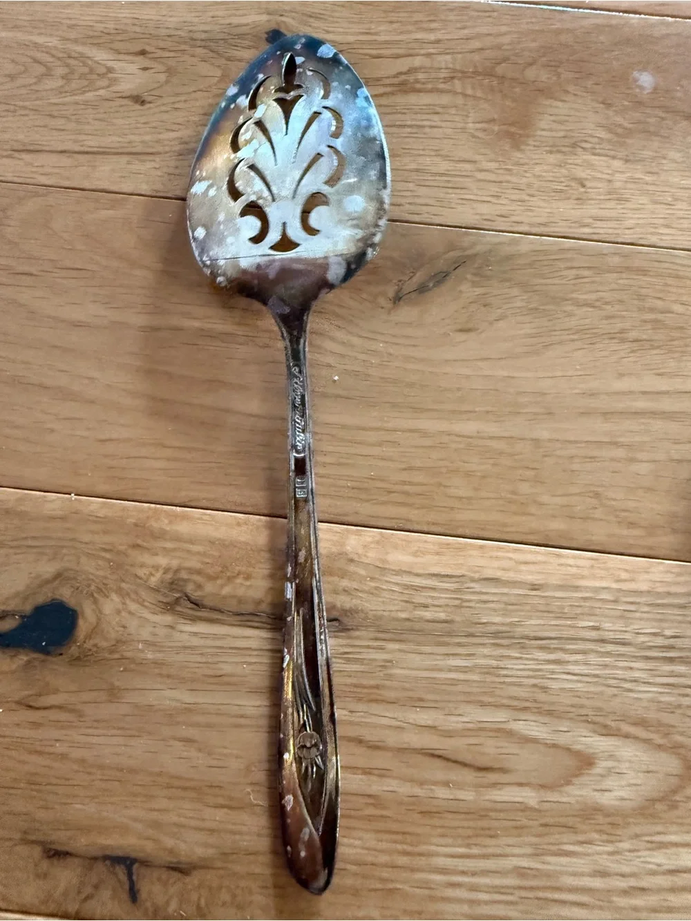 Ornate Pierced Serving Spoon in Aged Silver